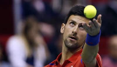 Davis Cup: Andy Murray puts holders Britain ahead, Novak Djokovic excels for Serbia