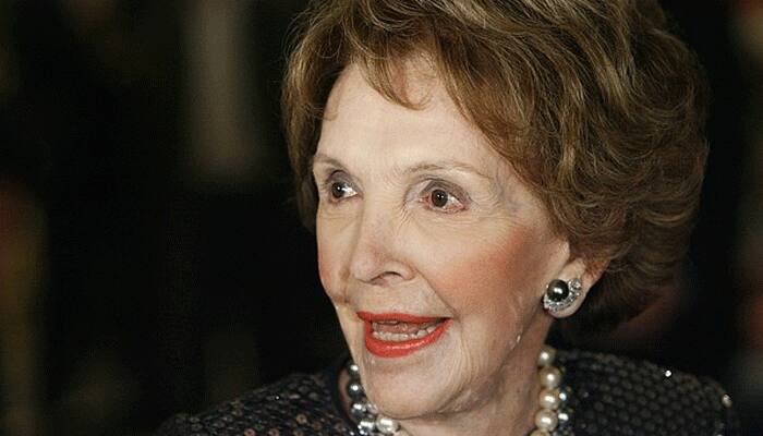 Obamas pay tribute to Nancy Reagan as 'proud example'