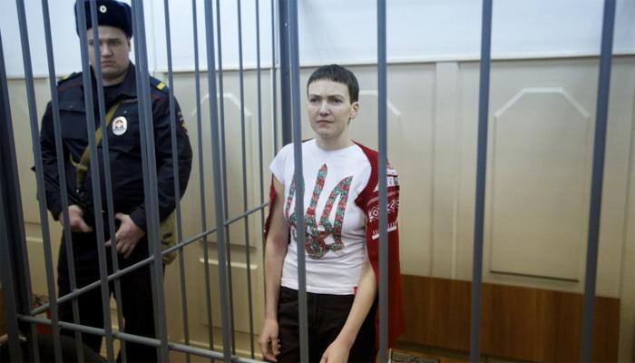 In Russian court, Ukrainian pilot Savchenko raises middle finger at judge