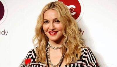 Madonna's daughter plays peacemaker
