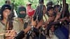 Philippines-based Abu Sayyaf threatens to kill four hostages if ransom not paid