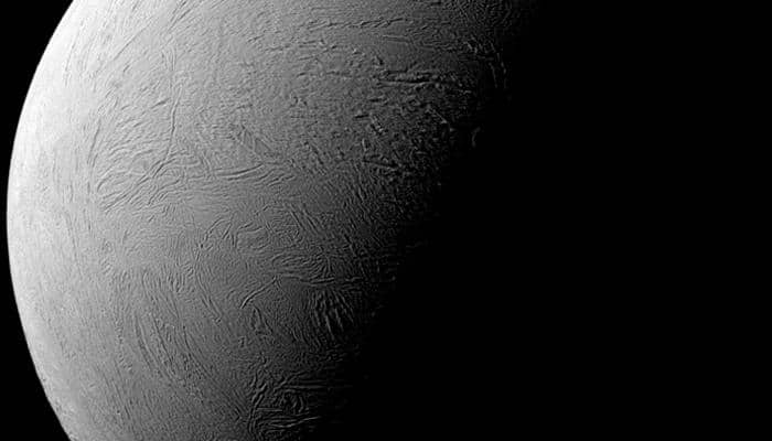 Cassini spots tilted terminator of Saturn’s moon Enceladus