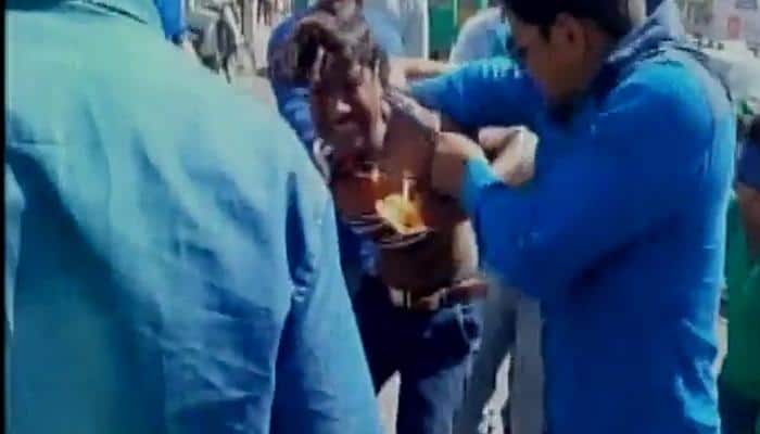 Owaisi too hot to handle! ABVP worker catches fire while burning Asaduddin&#039;s effigy-Watch