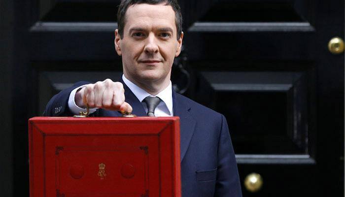 British budget extends austerity, cuts growth outlook 