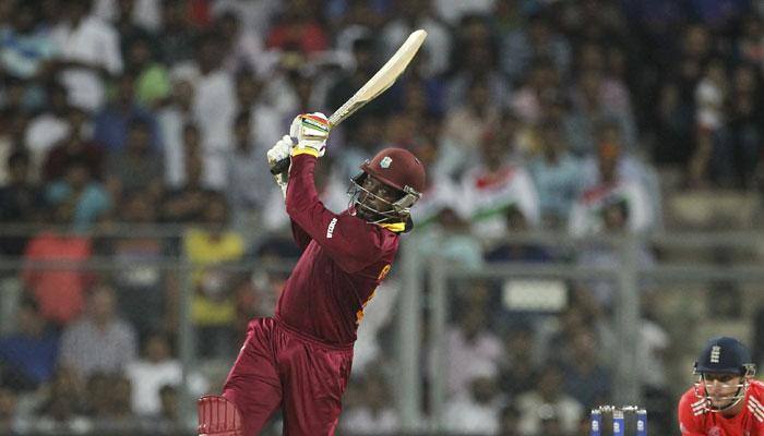 ICC World T20 2016: Chris Gayle guides West Indies to six-wicket win over England with record ton