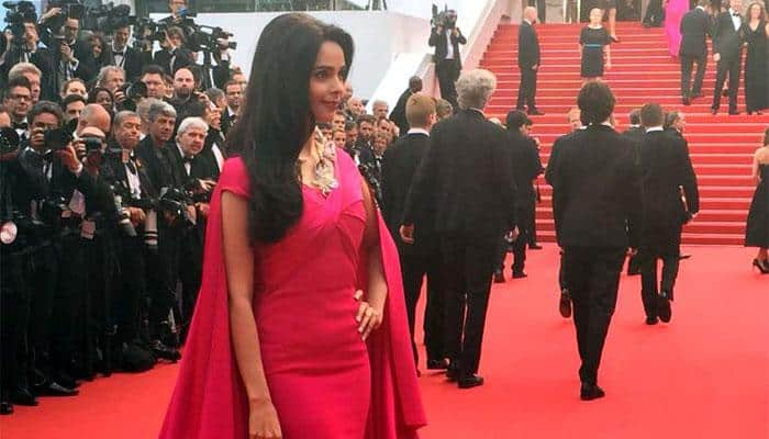 Mallika Sherawat &#039;in love&#039; with French tycoon Cyrille Auxenfans!