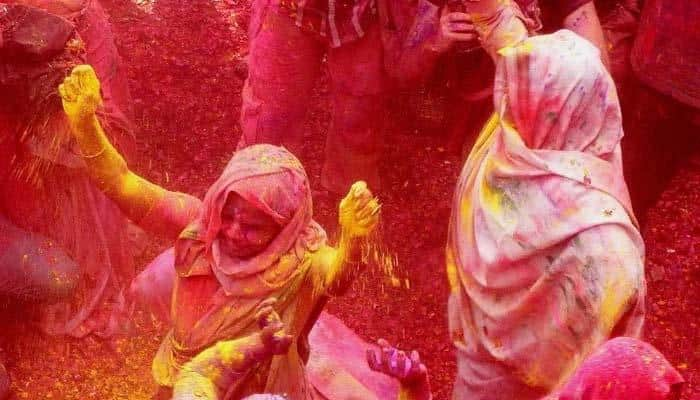 Widows play holi at Gopinath temple in Vrindavan