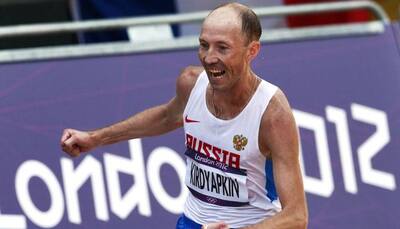 Russian race walkers Kaniskina, Kirdyapkin stripped of 2012 Olympic medals