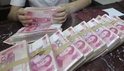 China stocks flat despite yuan weakness, property curbs