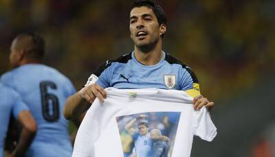 World Cup qualifying: Luis Suarez strikes on return from ban as Uruguay hold Brazil
