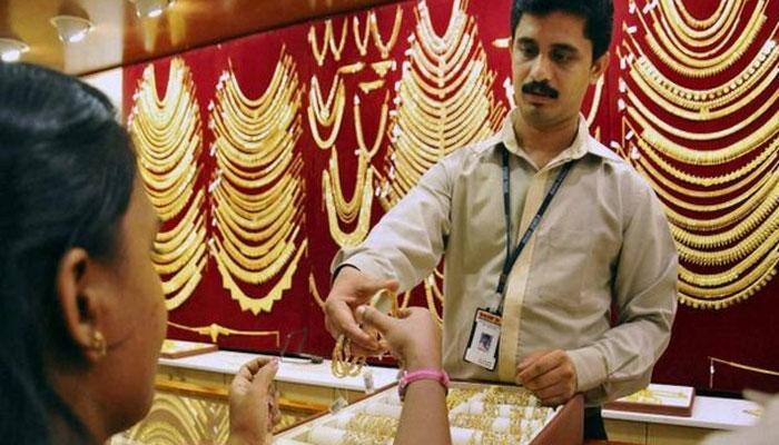 Gold price rebounds on renewed demand, silver weakens