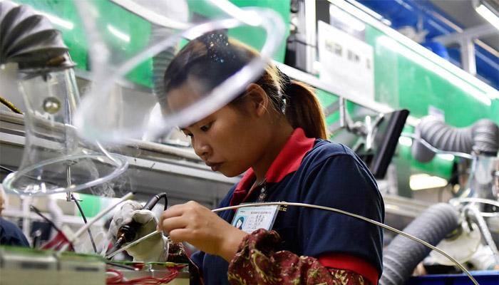 China manufacturing expands for first time in 9 months