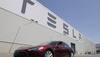 Tesla unveils $35,000-Model 3 with range of 215 miles