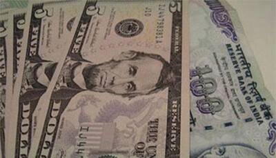 Rupee changes track, slips 11 paise to 66.57 against dollar