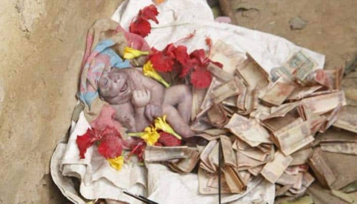 IN PICS: People throng to worship infant, claim him to be an 'incarnation of Lord Hanuman'