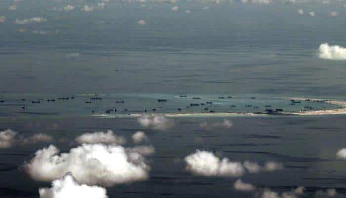 Chinese military aircraft makes first public landing on disputed island