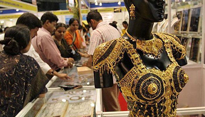 Gold price eases by Rs 100 to Rs 29,800 per ten grams