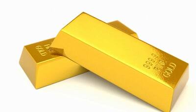 Gold extends slide on weak global cues, muted demand