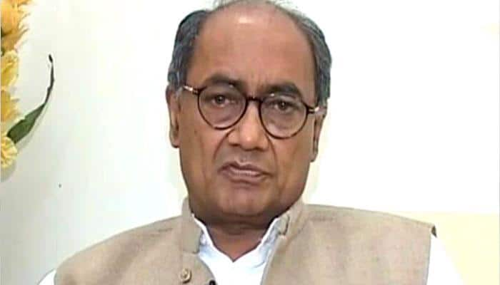 RSS critic Digvijay Singh visits VHP office in Delhi, gifted Ashok Singhal&#039;s biography