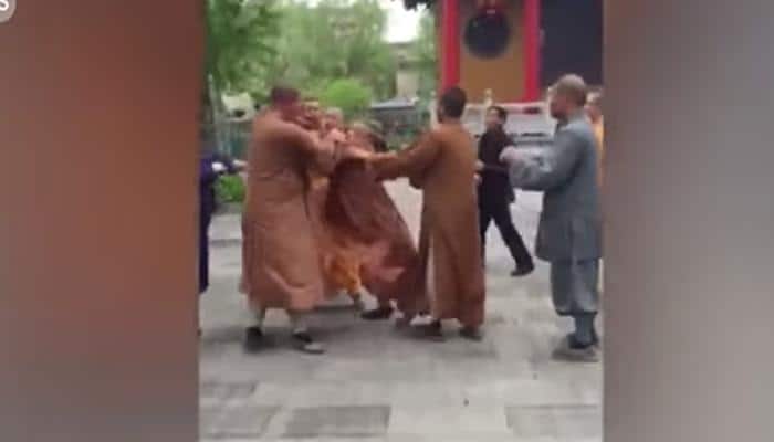It&#039;s actually shocking! Three monks get involved in brawl at Buddhist temple in China - Watch