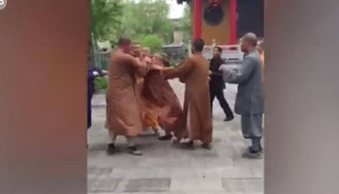 It's actually shocking! Three monks get involved in brawl at Buddhist temple in China - Watch