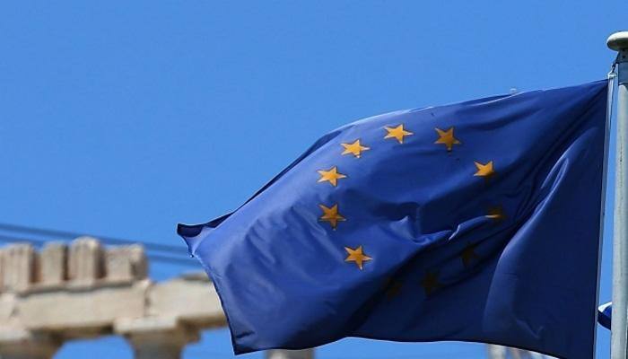 Defending migrant deal, EU seeks end of visas for Turks