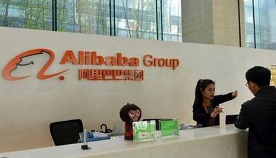 China e-commerce giant Alibaba`s quarterly revenue leaps 39%