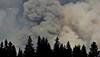 Airlift for thousands trapped by Canada wildfires