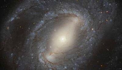 Isn't this beautiful? Hubble image of barred spiral galaxy (pic inside)!