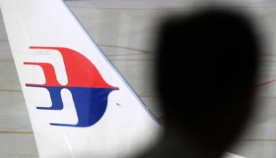 Two new aircraft fragments ''almost certainly'' from missing MH370 plane