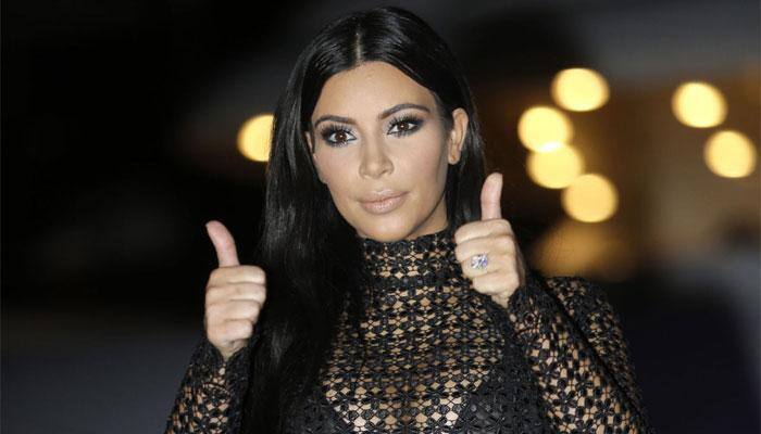Kim K back on cover with Vogue post Saint West's delivery