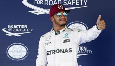Spanish Grand Prix: Defending champion Lewis Hamilton outpaces leader Nico Rosberg for pole