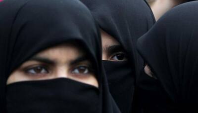 US man admits to ripping off woman's hijab on flight