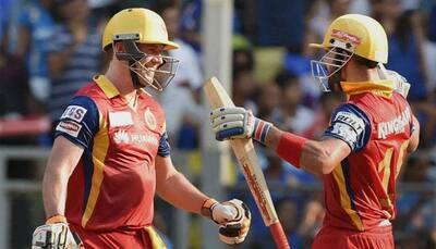 IPL 9: Mighty impressed with their consistency, Chris Gayle compares RCB's Virat Kohli, AB de Villiers with 'Batman and Superman'