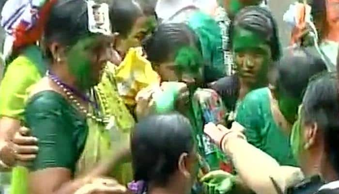 Celebrations outside Mamata Banerjee&#039;s house as TMC leads