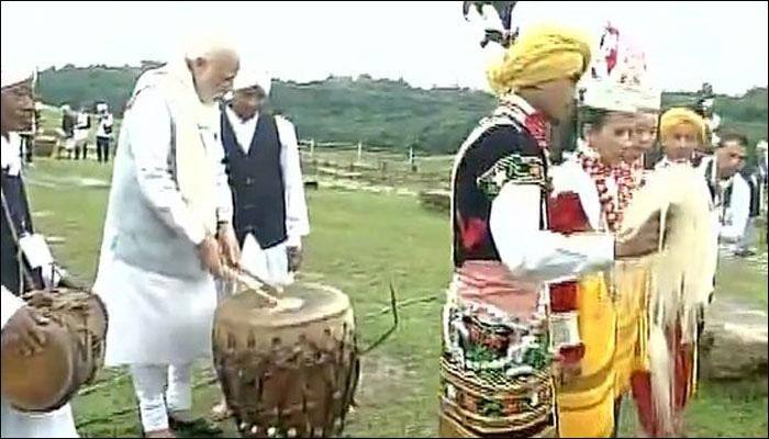 PM Narendra Modi plays traditional Khasi drum in Meghalaya