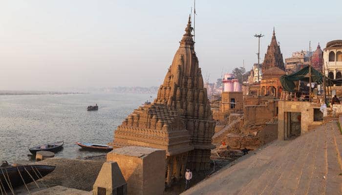 Incredible! This leaning Shiva Temple in Varanasi is partially submerged in Ganga