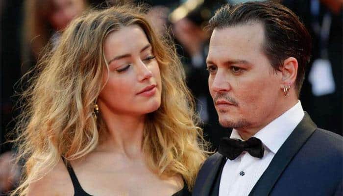 Amber Heard with Johnny Depp -"Amber was going to kill Johnny"