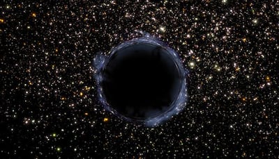 Supermassive black hole devouring cold gas cloud spotted