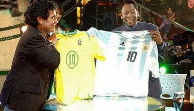 Old rivals Pele, Diego Maradona seek `peace`