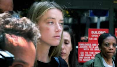 Is Amber Heard deliberately delaying deposition?