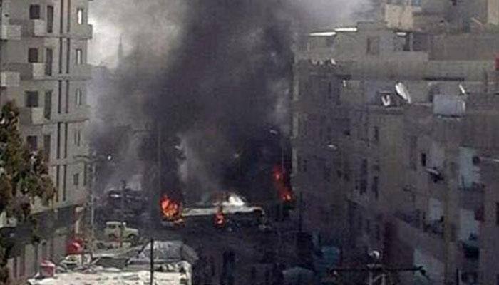 Suicide bombers 'kill 20' outside Syria shrine