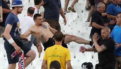 France ban alcohol near Euro 2016 venues after violence; England, Russia receive disqualification warnings