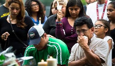 Orlando shooting: 'We're mourning and we are angry' - Thousands join first official vigil