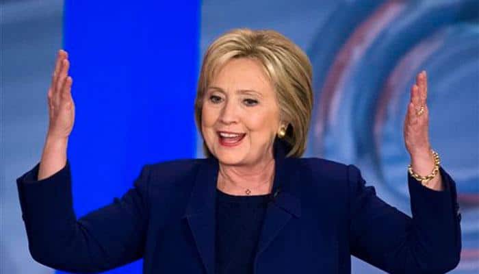 Hillary Clinton wins final 2016 primary as debate turns to terror fight