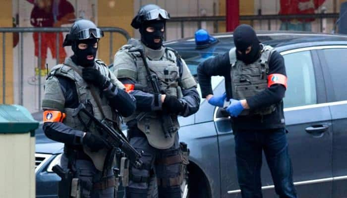 Belgium stages dozens of anti-terror raids, 12 held