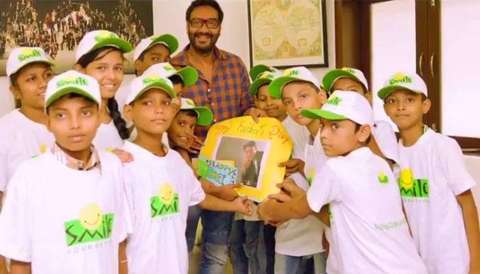 Father&#039;s Day special: Ajay Devgn spends candid time with underprivileged children