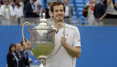History man: Andy Murray beats big serving Milos Raonic to win record fifth Queen`s title