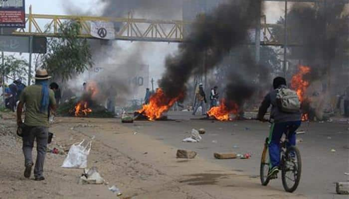 Three killed in Mexico clashes between police, teachers