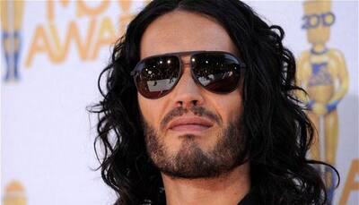 Russell Brand takes up yoga for unborn baby?